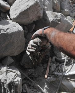 Pulling the dead from the rubble after Syrian government bombing, 2015